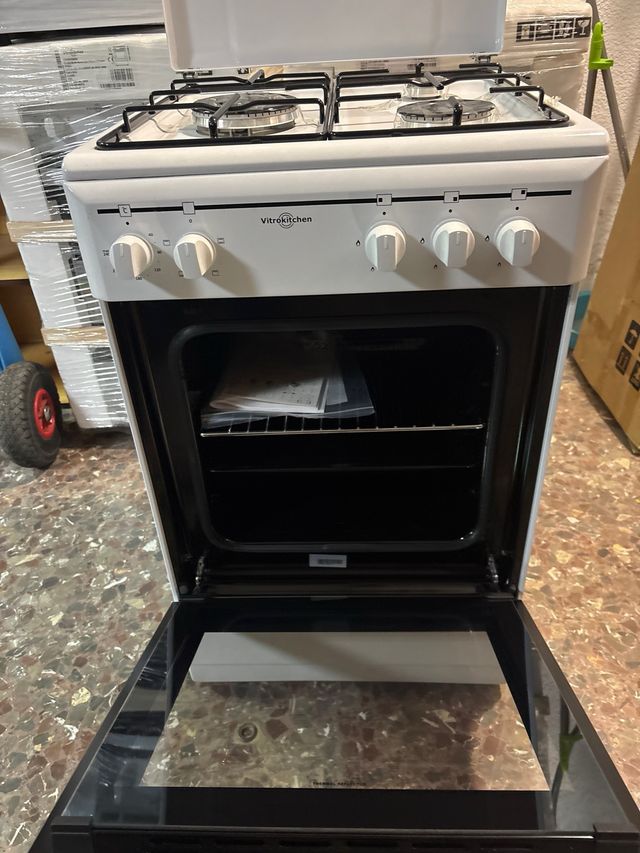 Cocina de butano con horno electrico