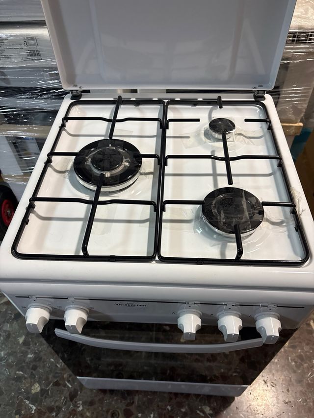 Cocina de butano con horno electrico