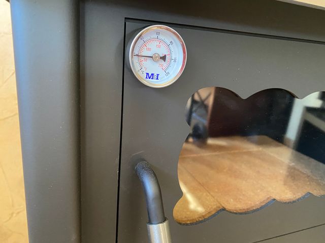 Estufa de leña con horno campana