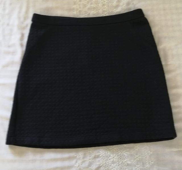 conjunto de cinco saias 4€ e uma bolsa de oferta 