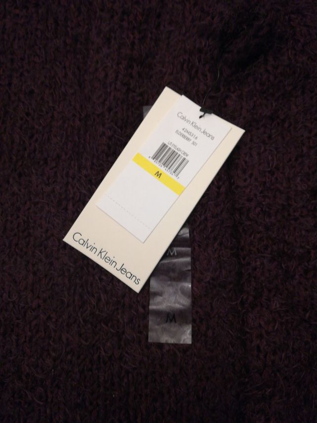 Jersey morado (nuevo).