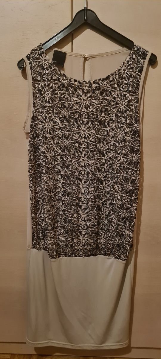 Abito con disegno traforato tg M