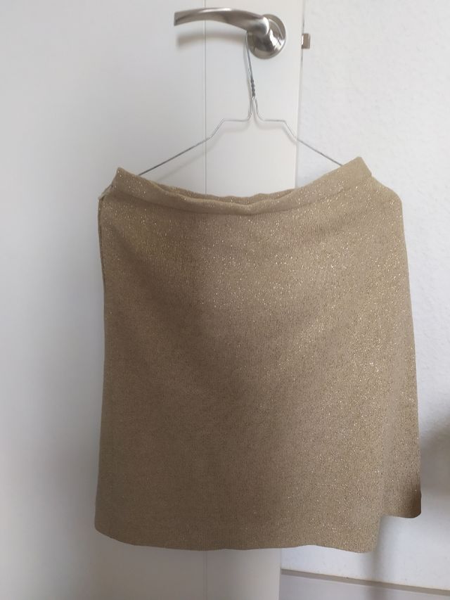 falda brillo dorado 38.6 euros!