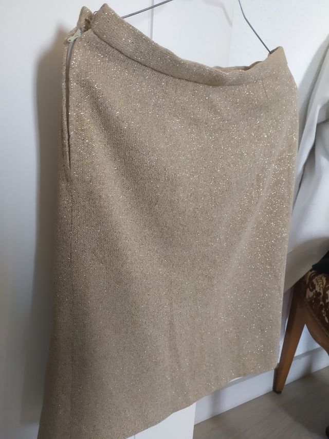falda brillo dorado 38.6 euros!
