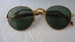 Gafas redondas doradas