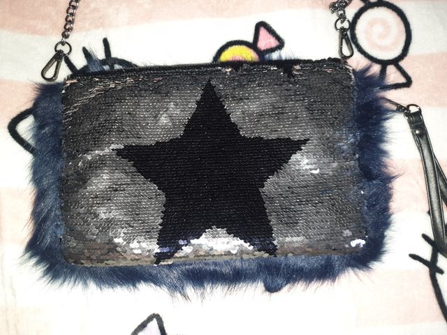 tracollina pelliccia e paillettes