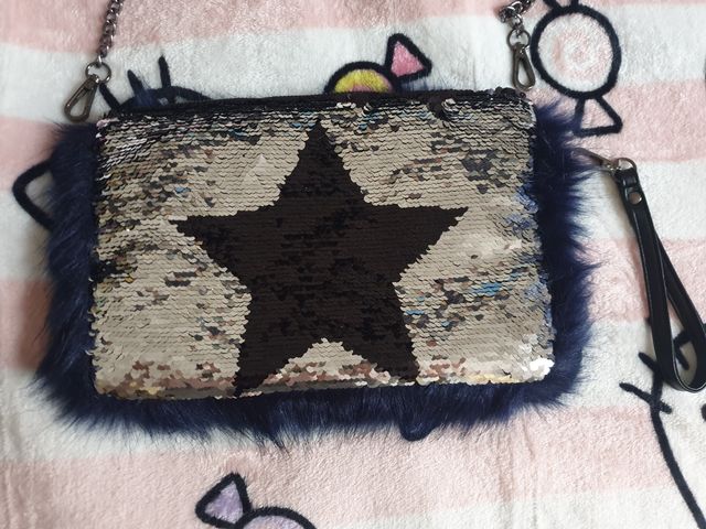 tracollina pelliccia e paillettes