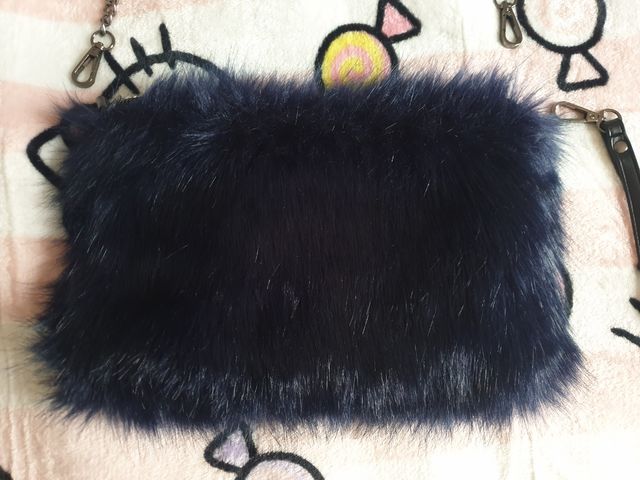 tracollina pelliccia e paillettes