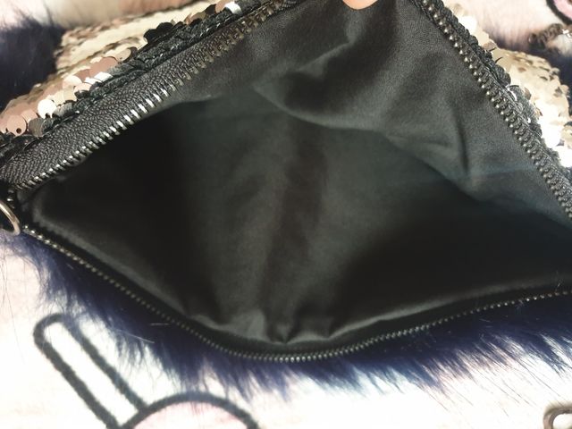 tracollina pelliccia e paillettes