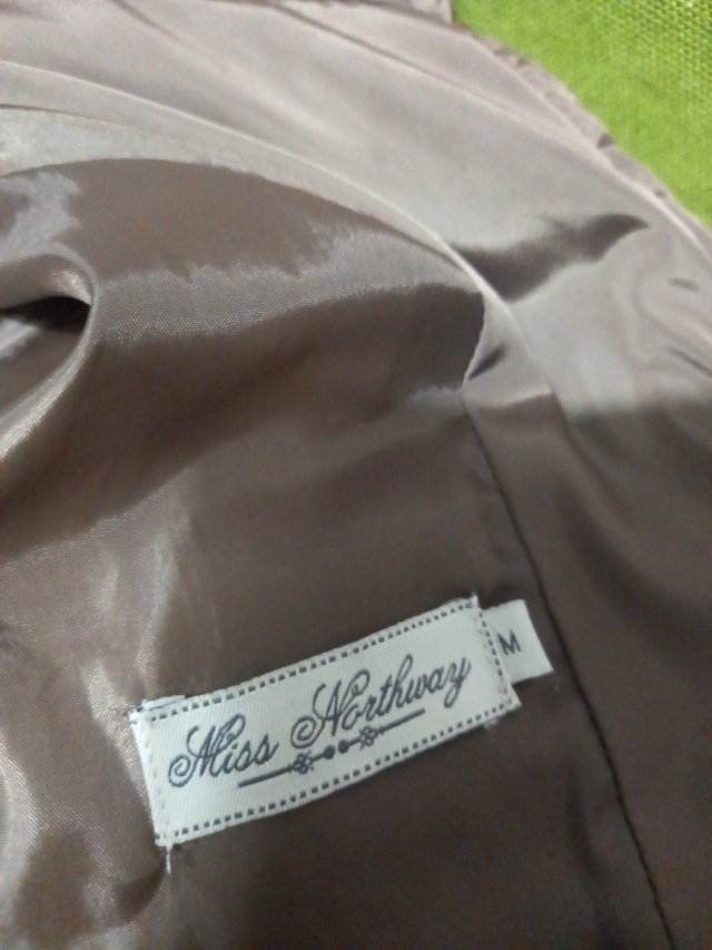 Plumífero color topo