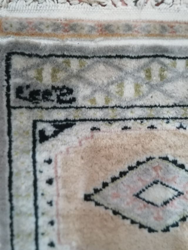 pequeña alfombra mini pakistaní