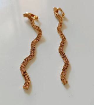 Pendientes largos dorados