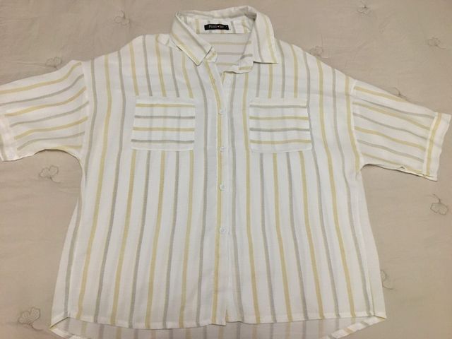 Camisa nueva, talla 42, de media manga.