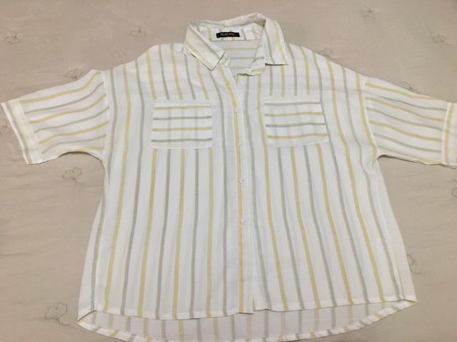 Camisa nueva, talla 42, de media manga.