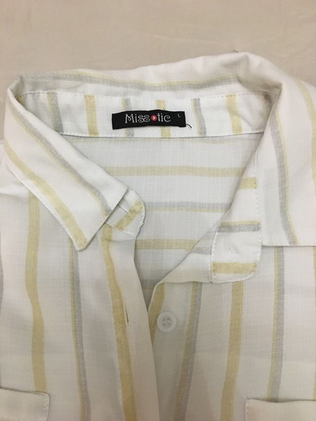 Camisa nueva, talla 42, de media manga.