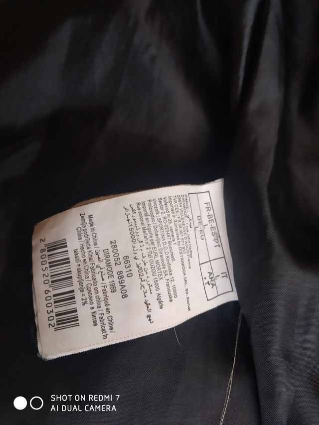 Abrigo negro con capucha pelo