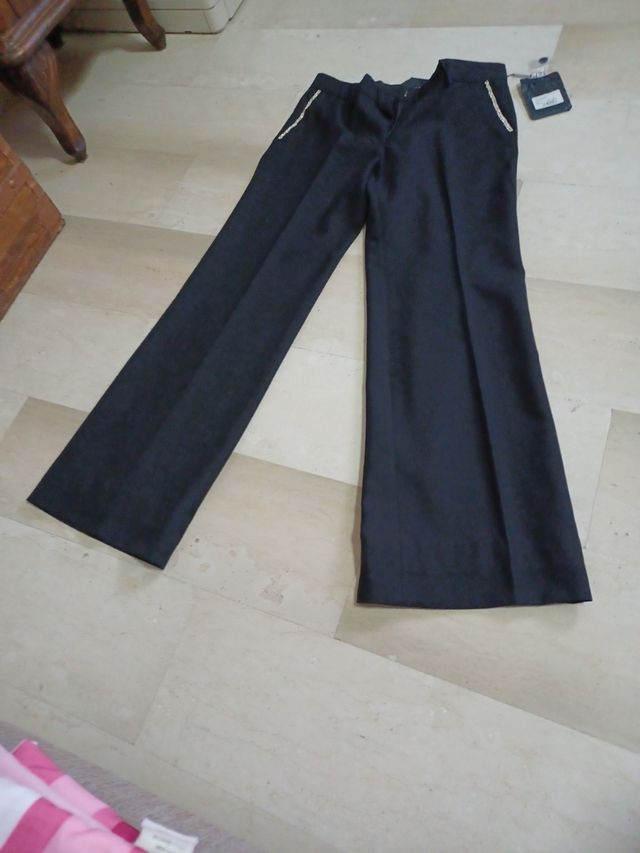pantalone con applicazioni