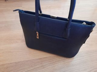 Bolso rígido de asas