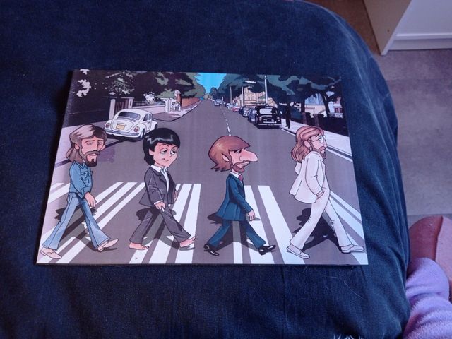 Lamina caricatura Beatles.