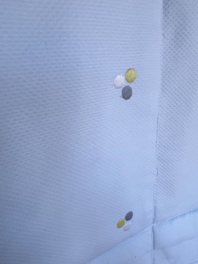 Colcha y protector de cuna marca Uzturre