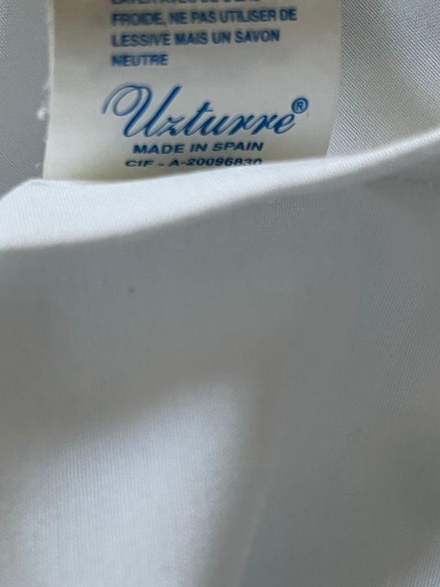 Colcha y protector de cuna marca Uzturre