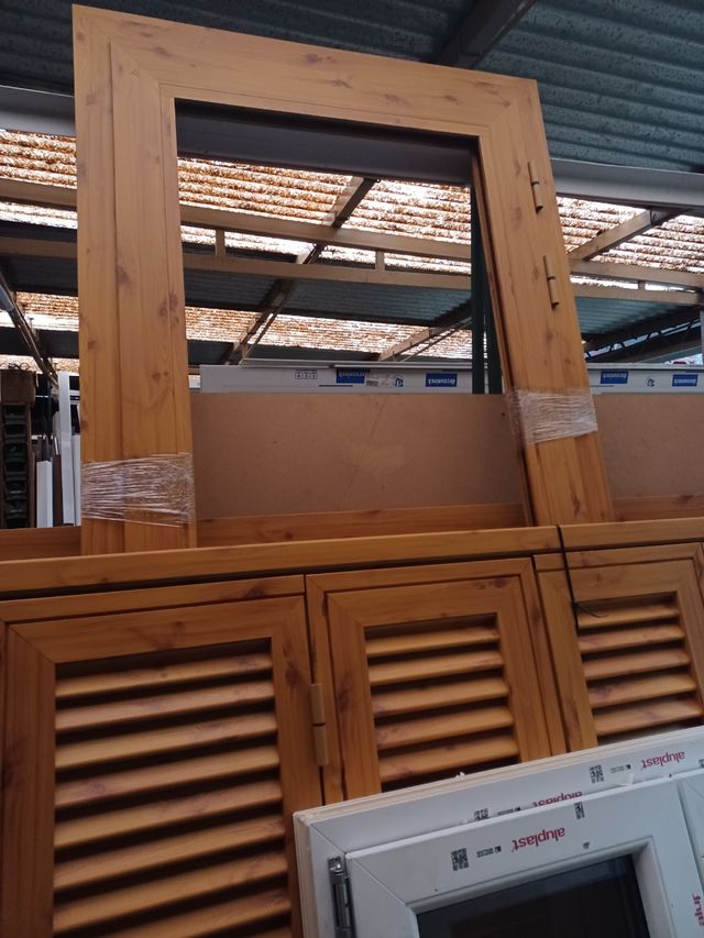 ventana dos hojas pino nudo