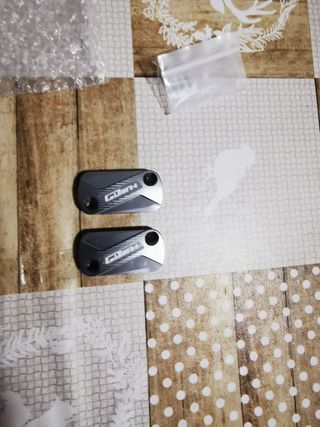 Tapa depósito freno para Kymco Grand Dink 