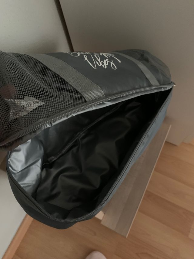 Bolso gris rejilla y parte isotérmica