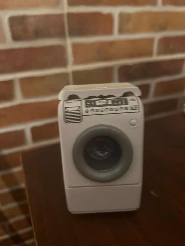 Cocina, lavadora y fregadero