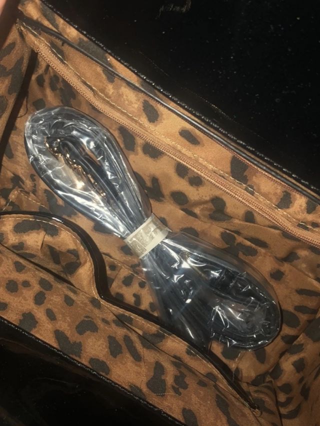 Borsa tipo baule motivo leopardato