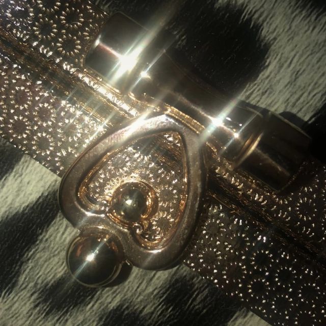 Borsa tipo baule motivo leopardato