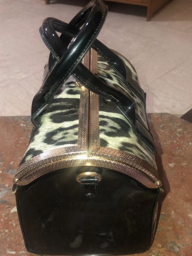 Borsa tipo baule motivo leopardato