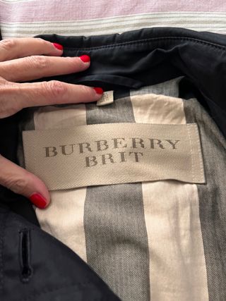 Original burberry brit con su funda 