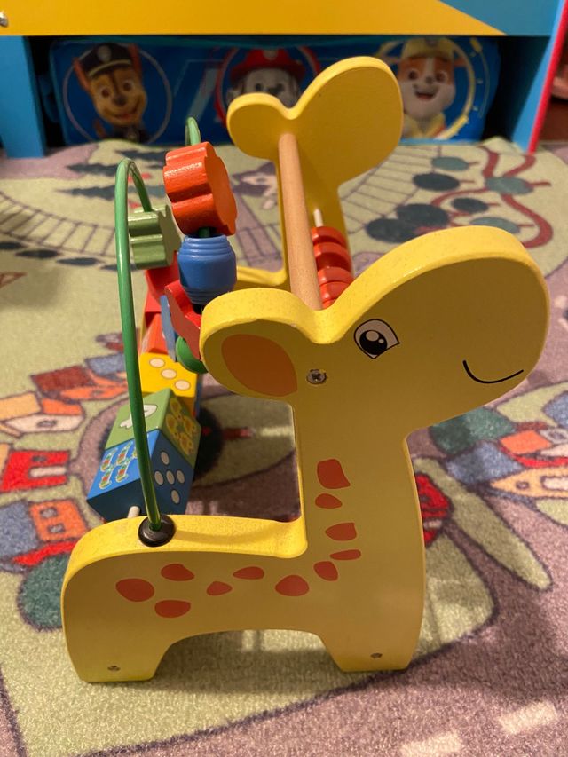 Jirafa de madera con Actividades.