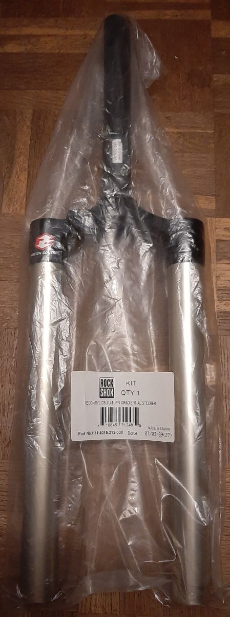 Puente con barras magnesio RockShox 32mm.