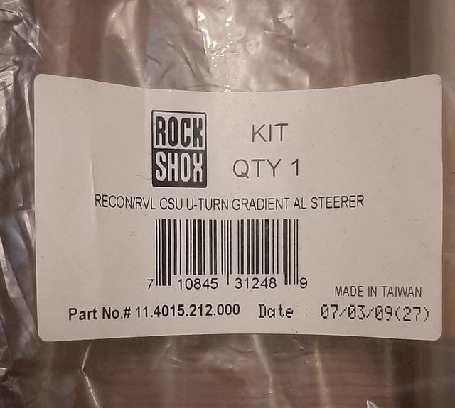 Puente con barras magnesio RockShox 32mm.