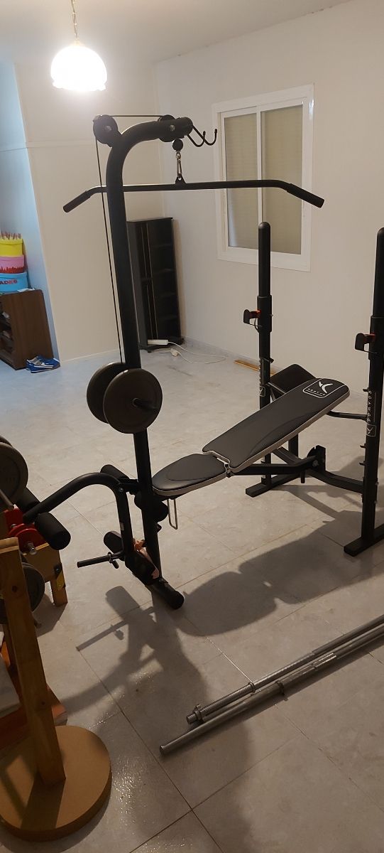Banco pesas multifuncional.
