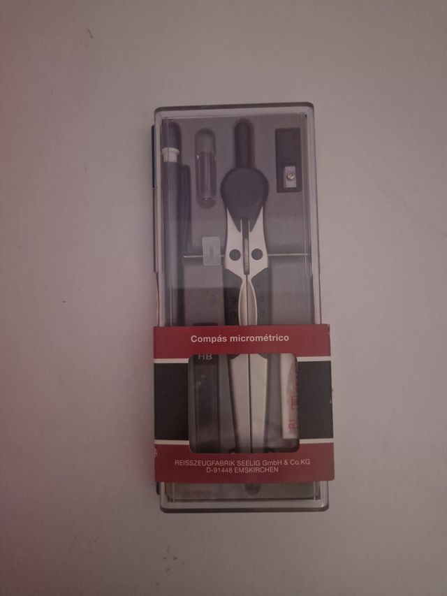 compás con accesorios (2 FOTOS)