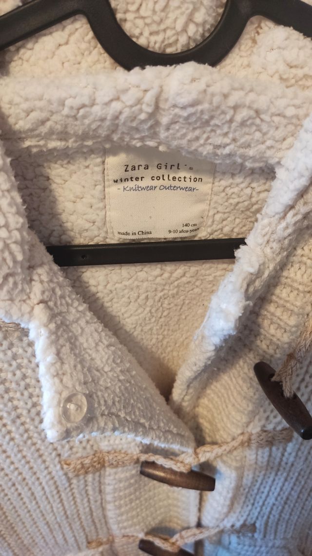 Jersey de punto beige, con interior