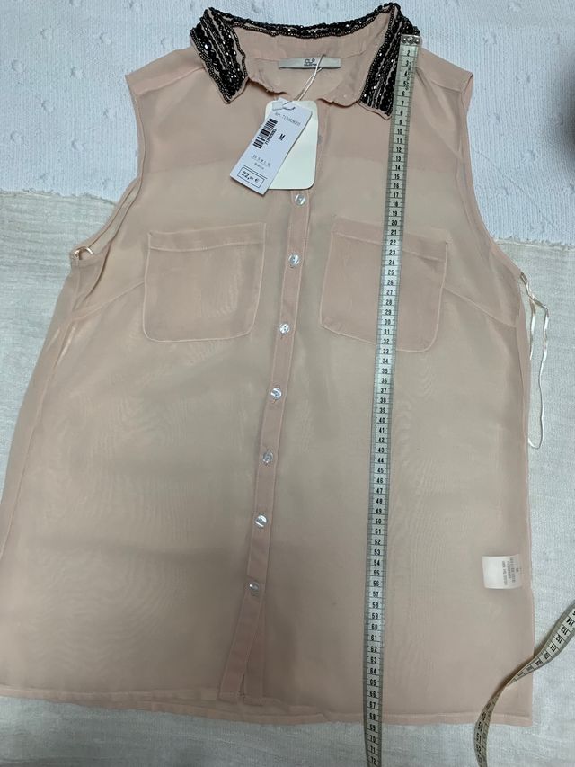 Blusa de fiesta con etiqueta