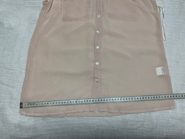 Blusa de fiesta con etiqueta