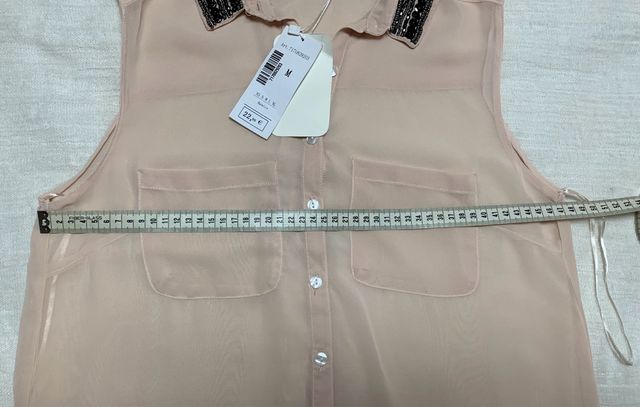 Blusa de fiesta con etiqueta