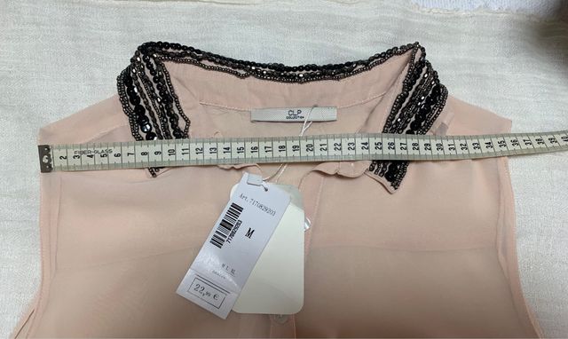 Blusa de fiesta con etiqueta