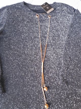 camisola de fiesta con colgante