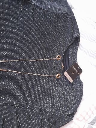 camisola de fiesta con colgante