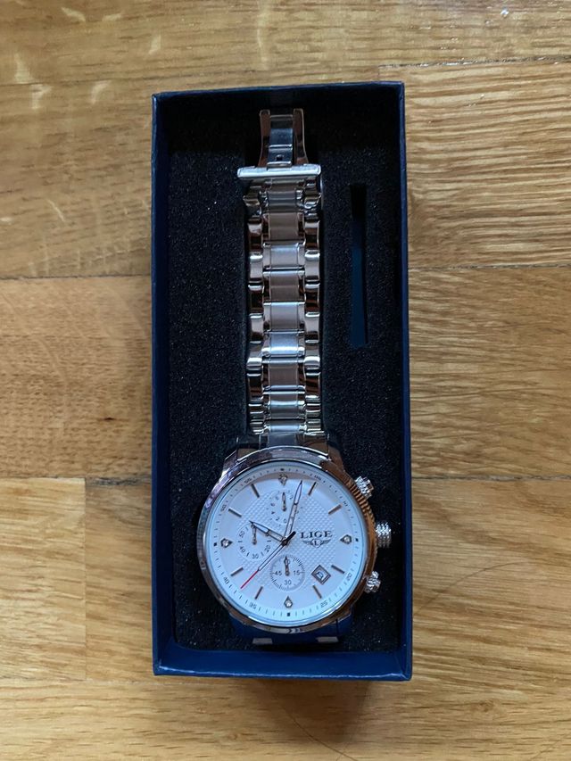 Reloj Lige Metálico