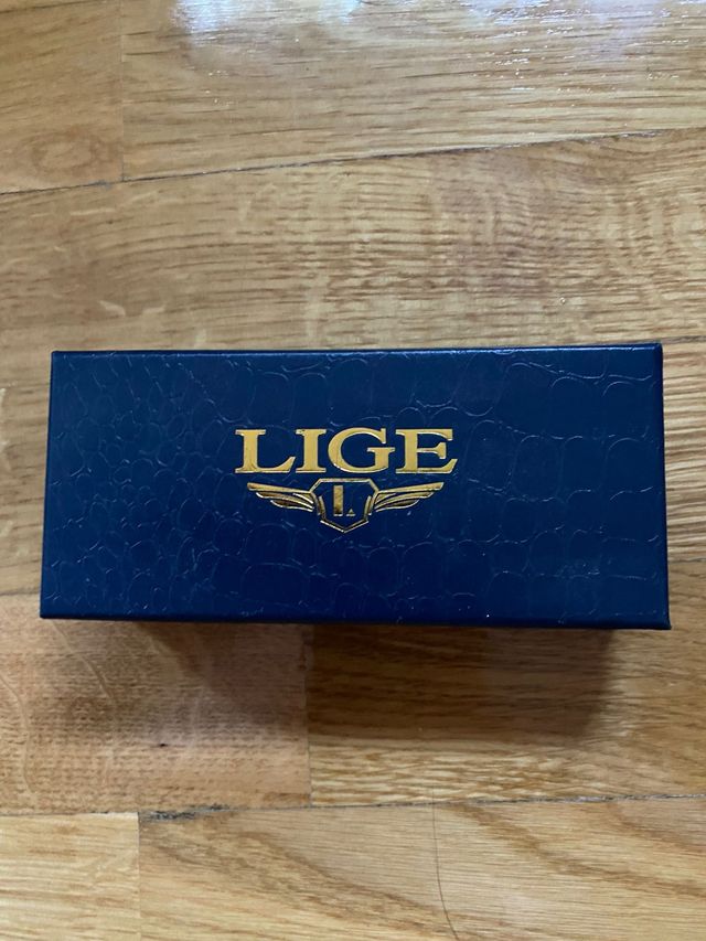 Reloj Lige Metálico