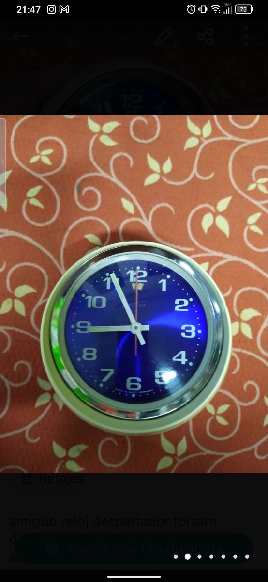 antiguo reloj despertador de la era espacial