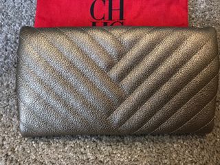 Bolso Clutch dorado Carolina Herrera