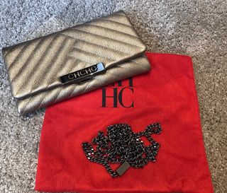 Bolso Clutch dorado Carolina Herrera